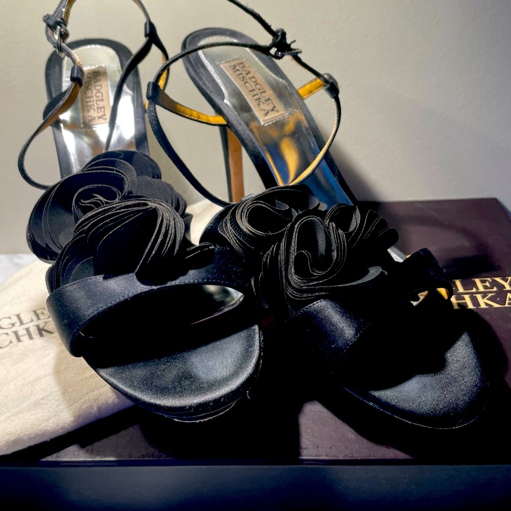 Elevate your style with Badgley Mishka’s Randee black satin stiletto 4.5” heel.